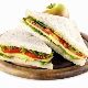 Lanches Tradicionais Sandu�che Natural - Ingredientes: Acompanha queijo minas, maionese, tomate, cenoura ralada e alface no p�o integral.