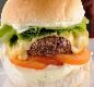 Sandu�ches Combinados (Acompanha Fritas e Refrigerante Lata) N�4-Cheese Salada - Ingredientes: Hamburguer, queijo prato, alface, tomate e maionese; promo��o acompanha uma por��o pequena de fritas e um refrigerante de lata a sua escolha, onde obrigat�riamente tem que ser mencionado no pedido o escolhido.