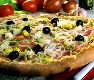 Pizzas Salgadas Portuguesa - Ingredientes: Mussarela, presunto, ovos e cebola.