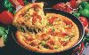 Pizzas Salgadas Baiana - Ingredientes: Calabresa mo�da, ovos, cebola e pimenta.